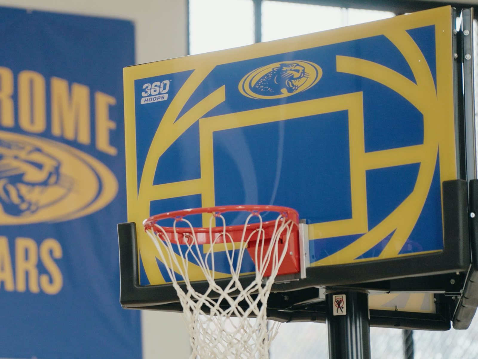 St. Jerome Jaguars custom-branded 360 Hoops backboard